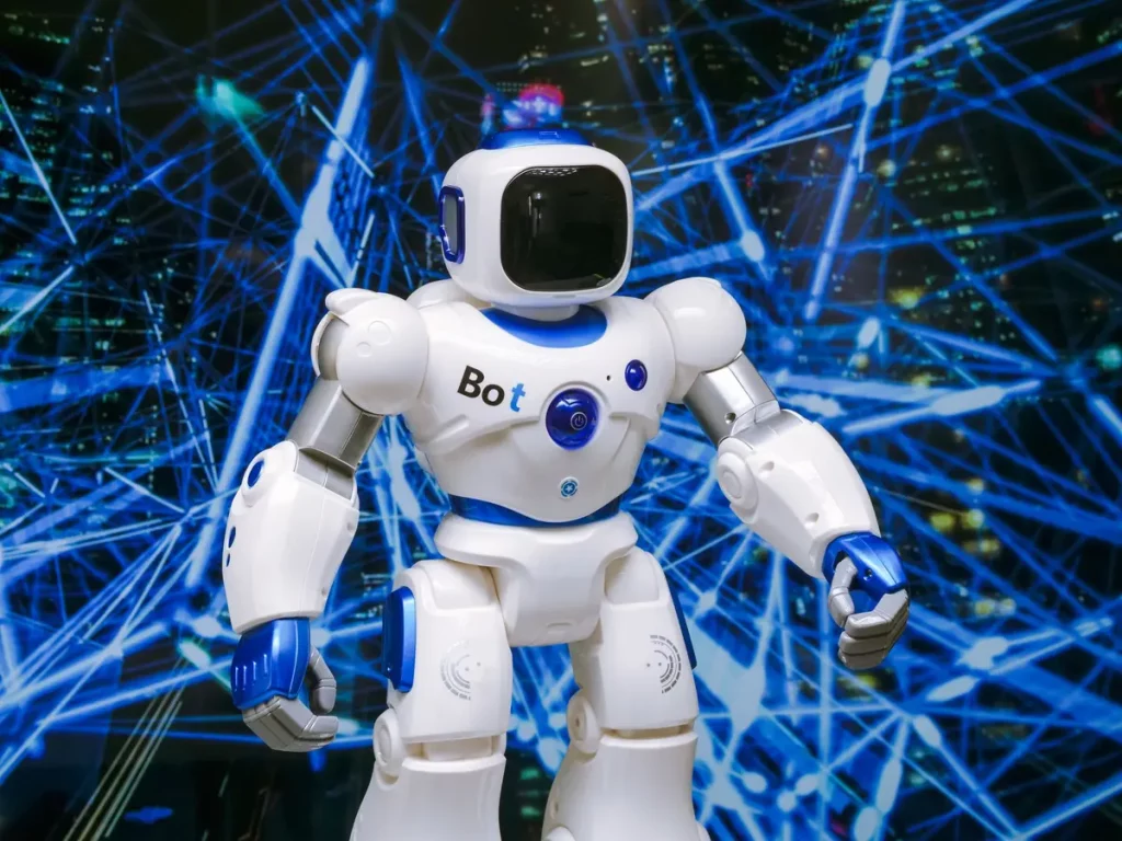 Robot humanoid dengan aksen biru di latar jaringan digital, ilustrasi cara menerapkan AI agent di perusahaan